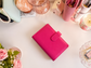 Classic A6 budgeting binder available in pink and ivory, designed for cash envelopes, savings challenges, and inserts.