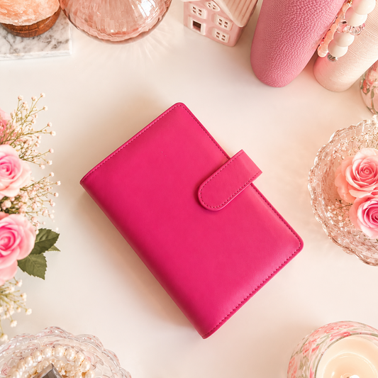 Classic A6 budgeting binder available in pink and ivory, designed for cash envelopes, savings challenges, and inserts.