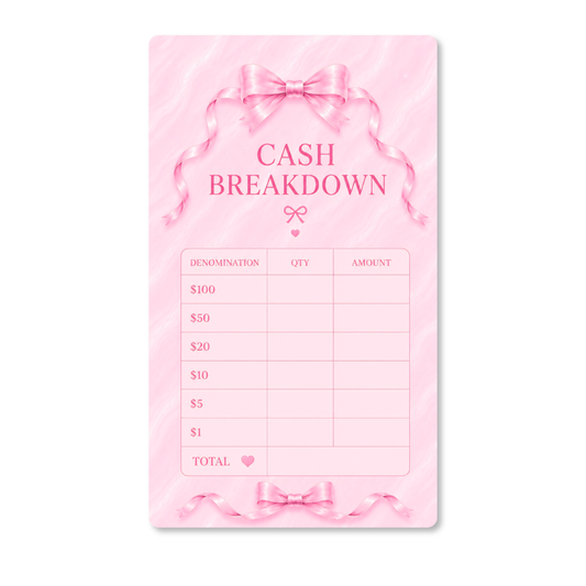Dreamy Ribbon Cash Breakdown Card displayed inside a pink A6 cash stuffing binder with gold rings on a white marble desk, featuring a feminine pink ribbon design for tracking cash denominations.