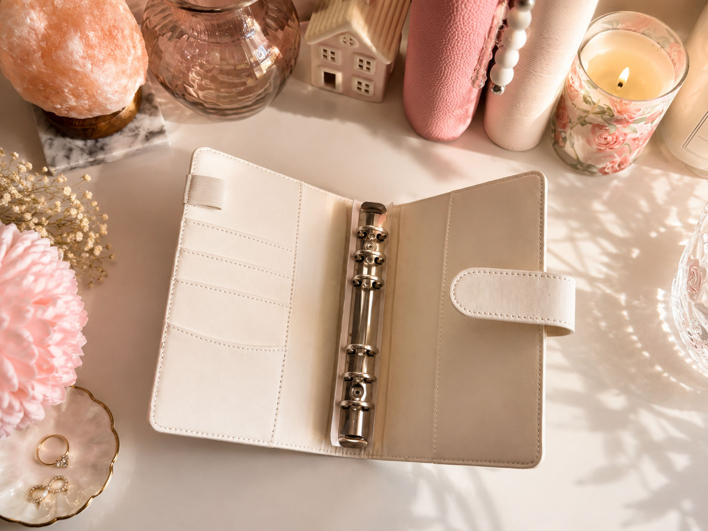 Classic A6 budgeting binder available in pink and ivory, designed for cash envelopes, savings challenges, and inserts.