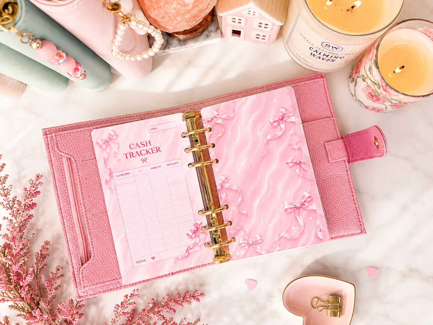 Pink Dreamy Ribbon cash tracker insert with satin bow details, a marble-inspired background, and pre-punched holes for an A6 budget binder.