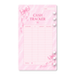 Pink Dreamy Ribbon cash tracker insert with satin bow details, a marble-inspired background, and pre-punched holes for an A6 budget binder.