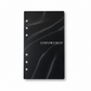 Black planner cover with 'EMPOWERED' text on a white background