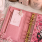 Cute pink Ghostface-inspired cash stuffing savings challenge insert for A6 budget binder with heart-themed savings tracker and laminated finish.